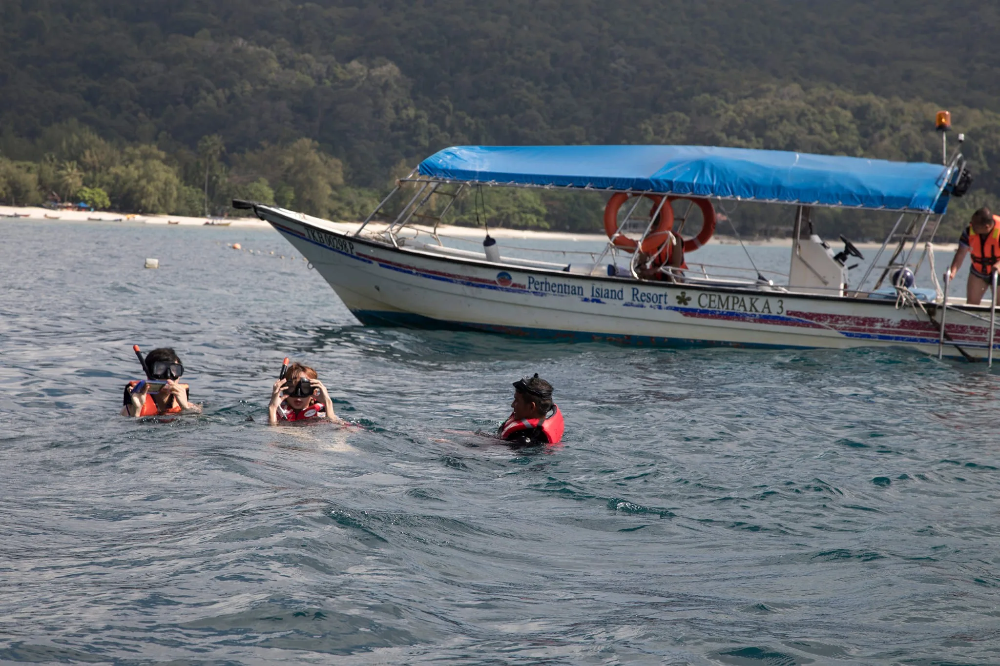 Perhentian Island Resort 3D2N Fullboard Snorkeling Package — beach and snorkeling activities on Perhentian Islands