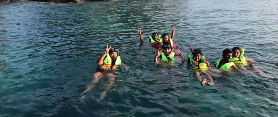 Cocohut Long Beach Resort beachfront holiday chalets with snorkeling activities at Pulau Perhentian, Malaysia